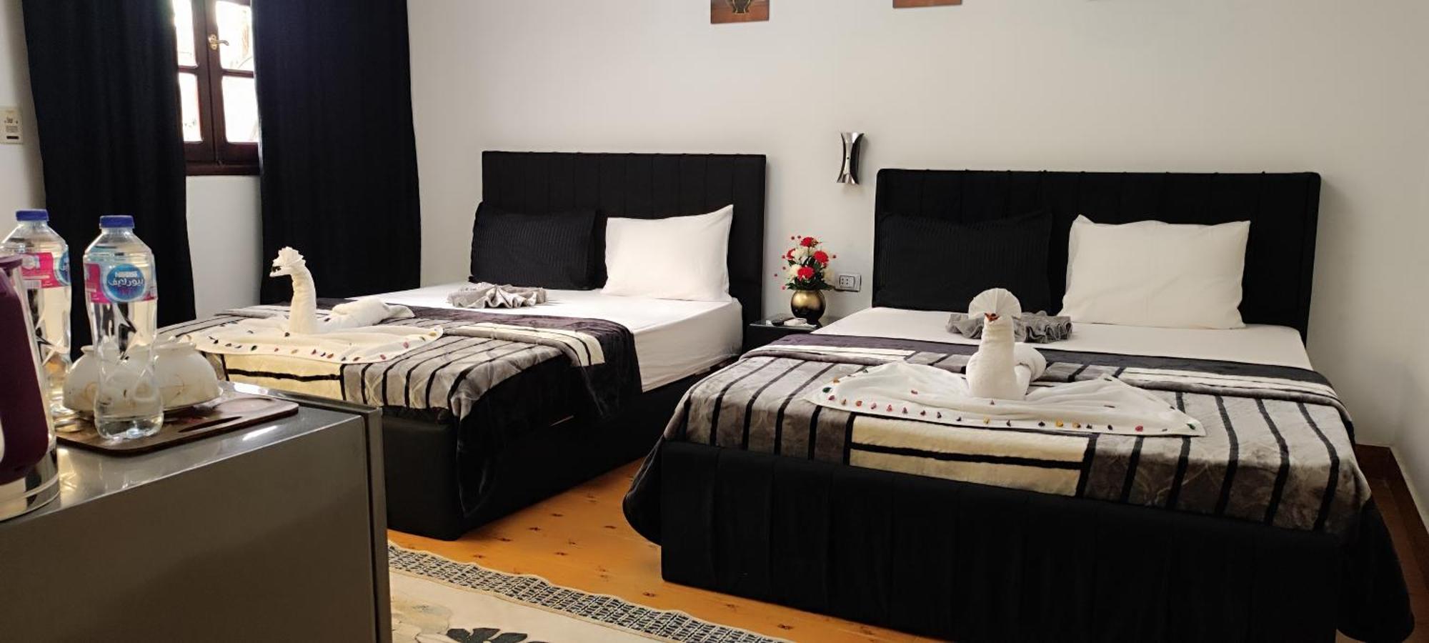 Pyramids Kingdom - Guest House Kafret el-Gabal Extérieur photo