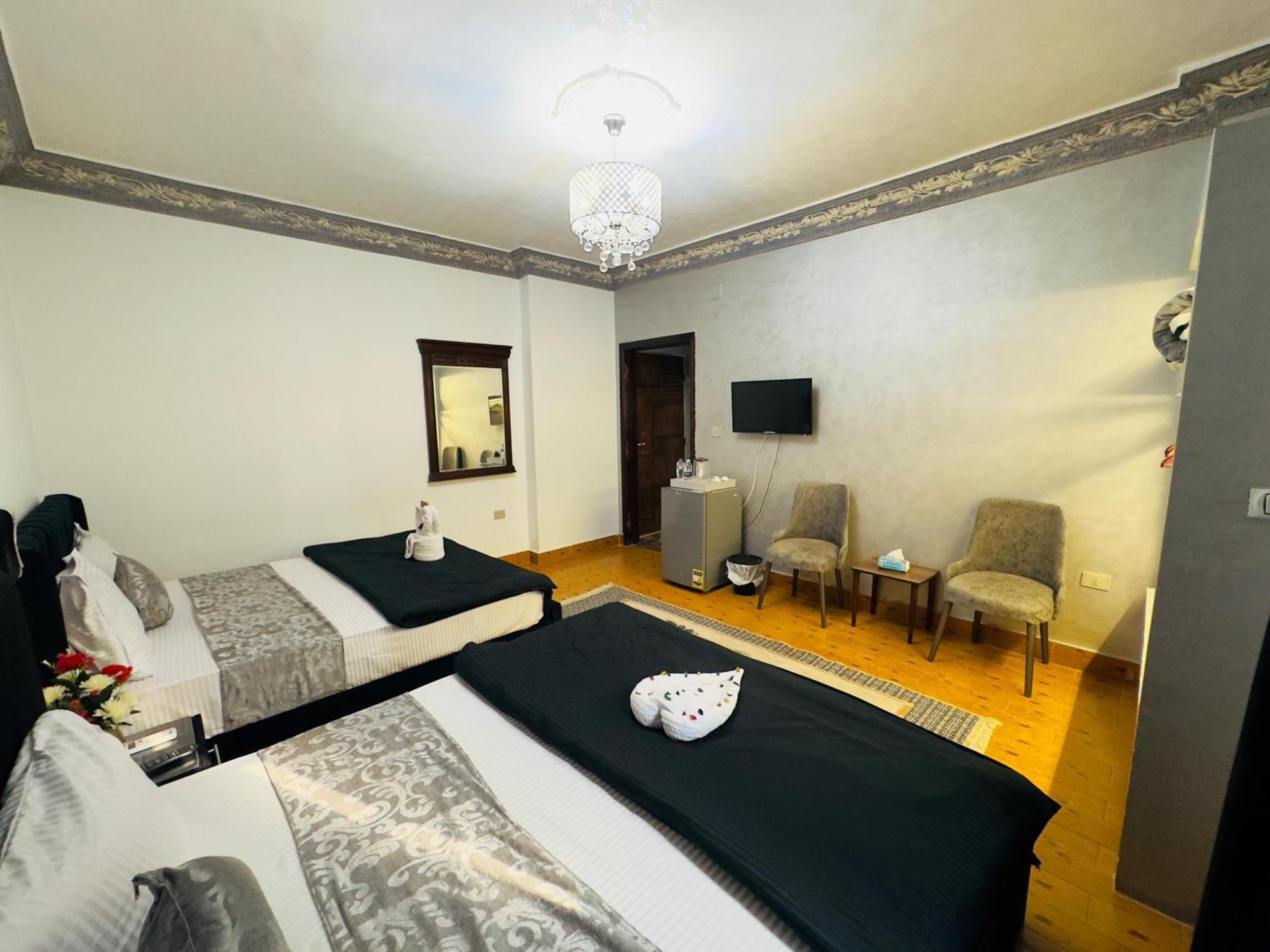 Pyramids Kingdom - Guest House Kafret el-Gabal Extérieur photo